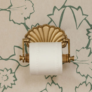 shell-brass-loo-roll-holder-on-the-wall